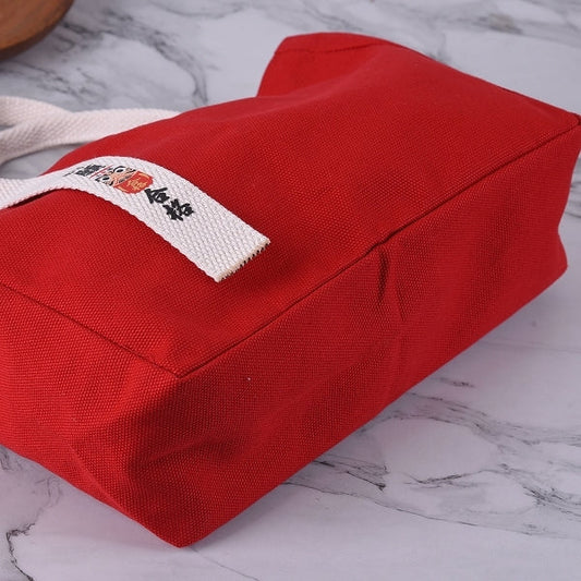 紅色帆布單飄帶立體手提包