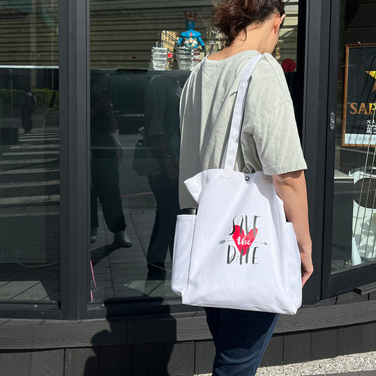 白色兩側口袋大容量帆布包