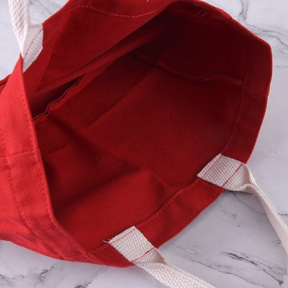 紅色帆布單飄帶立體手提包