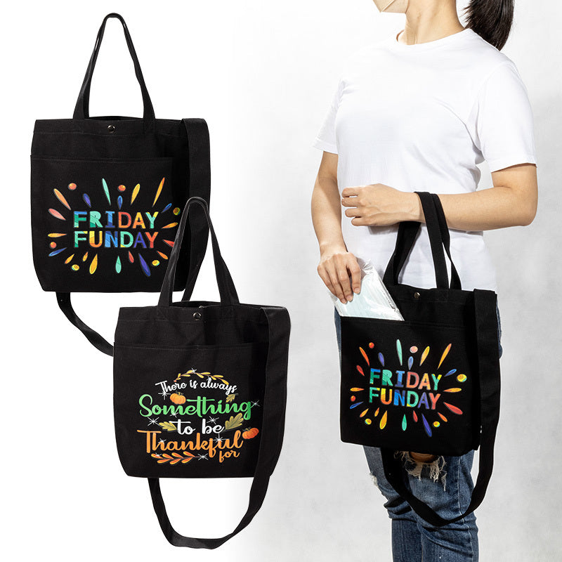 黑色外口袋手提斜背帆布包